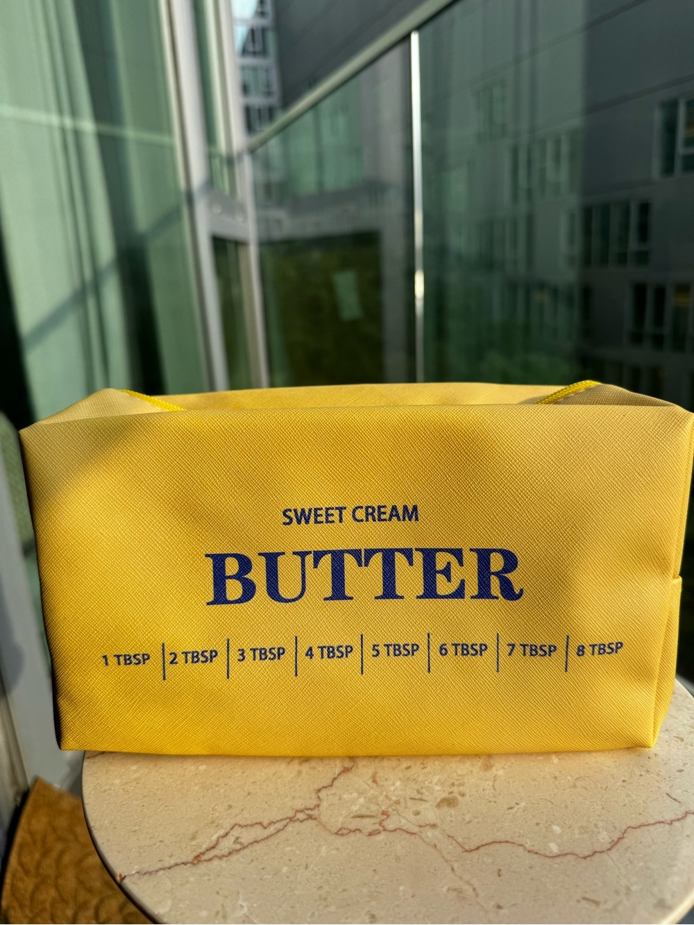 Butter Sweet Cream Yellow Cosmetic Pouch with Assorted Makeup - Picture 3 of 3